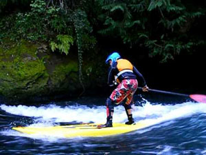 stand up paddle lessons Phuket with a whitewater board