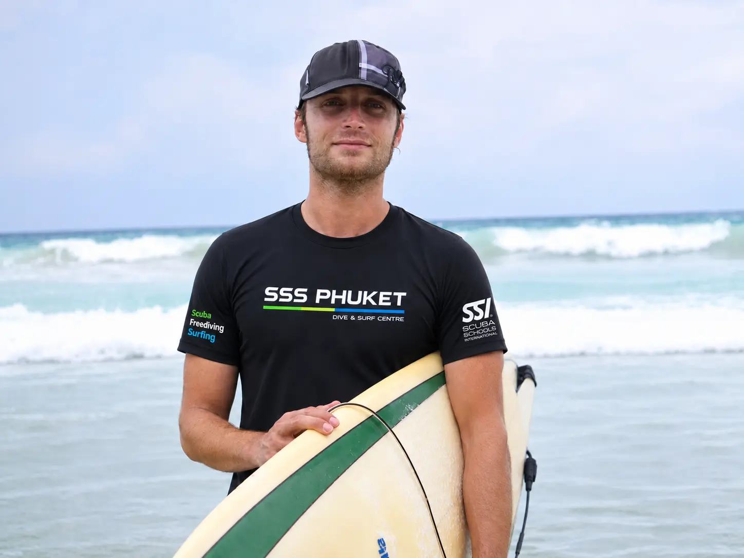 Free SSS Phuket t-shirt worn by a surfer at Kata Beach